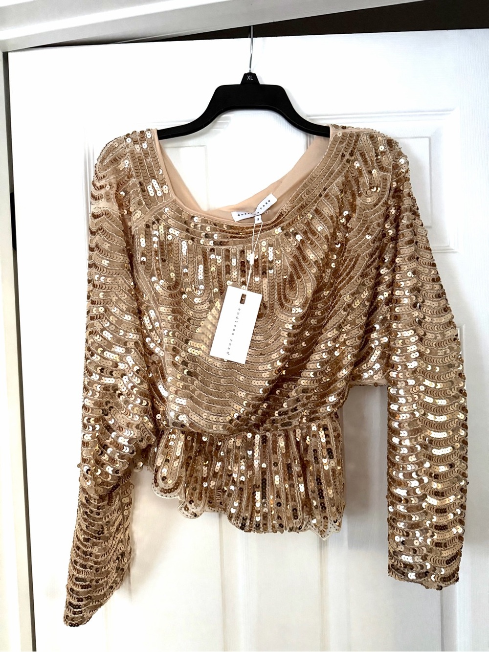 Endless Rose Gold Sequin Peplum Long Sleeve Top